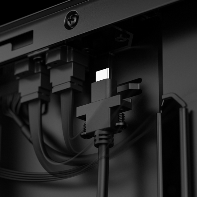 A USB-C connector is being connected.